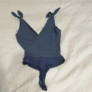 Blue bodysuit deep V with tied shoulders XS